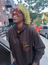 Load image into Gallery viewer, &quot;Be the Glow&quot; Hoodie - CHOCOLATE (Yellow/Brown)
